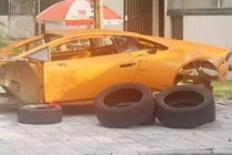 "Siêu bò" Lamborghini Huracan bị lột trơ khung ở vỉa hè Hà Nội