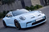 Porsche 911 GT3 từng của Cường Đô la được dán đổi màu xanh ngọc bích