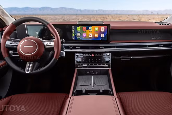 Dù cụm điều khiển trung tâm vẫn đang được che chắn kỹ lưỡng, nhiều nguồn tin cho rằng SantaFe sẽ được trang bị hệ thống màn hình cong đôi PLEOS.